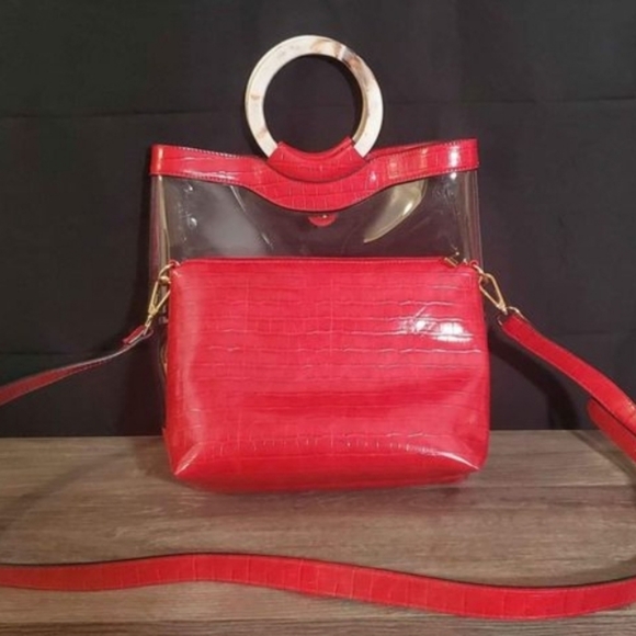 Clear bag with red trim, perfect for stadium use. - Picture 1 of 6